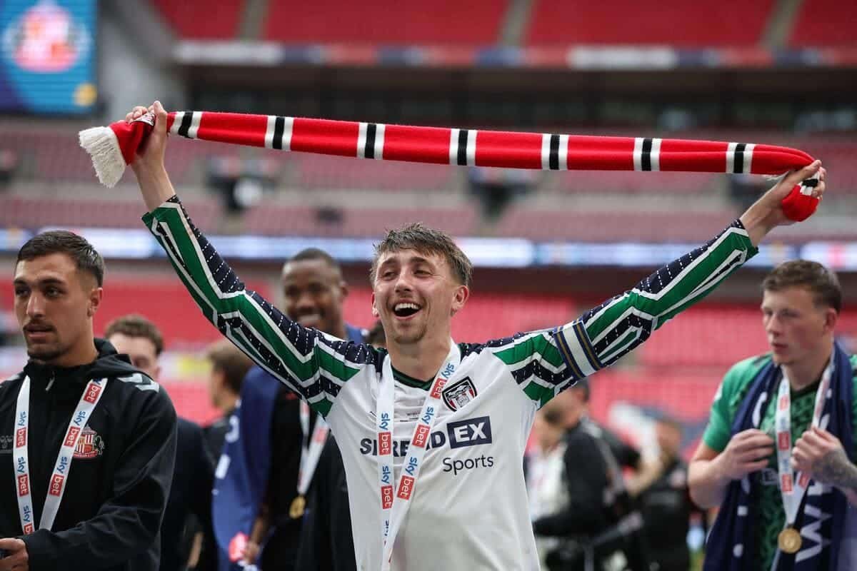 Promotion contenders Ipswich have snapped up Sunderland midfielder Dan Neil