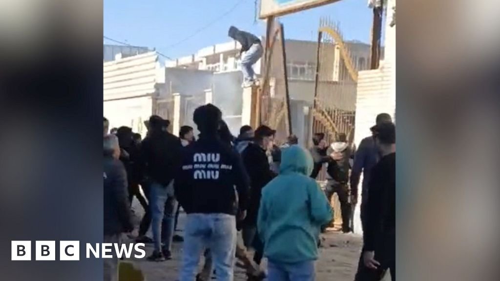 Riots continue as Iranian protesters try to break into government building