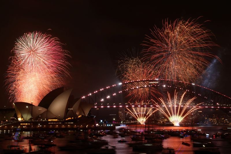 The world bids farewell to 2025 with fireworks and icy plunges