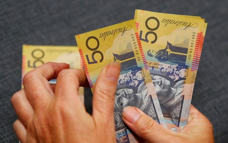 Australia’s major pension fund says Aussie dollar undervalued, boosts cash holdings