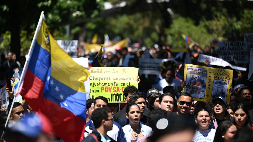 An opposition rally in Venezuela calls on the post-Maduro government to ensure full freedoms