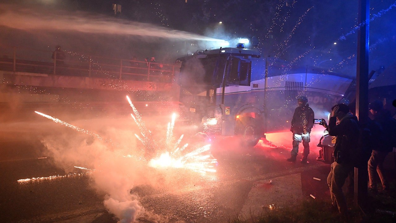 Demonstrators clash with police near Milan Winter Olympics venue