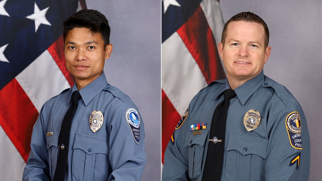 Georgia hotel room shootout leaves one police officer dead, another seriously injured