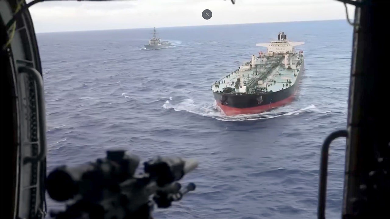 War Department announces boarding of ship after pursuit